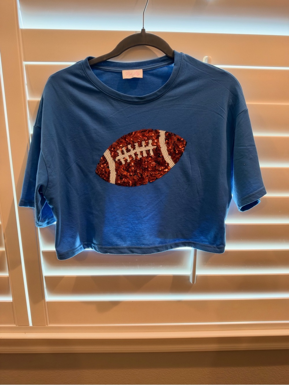 Pink Lily Blue Cropped Tee with Sequin Football Applique